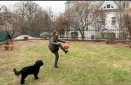 VIS Student playing soccer during PE Lesson