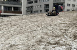 VIS Student tobogganing on Hill